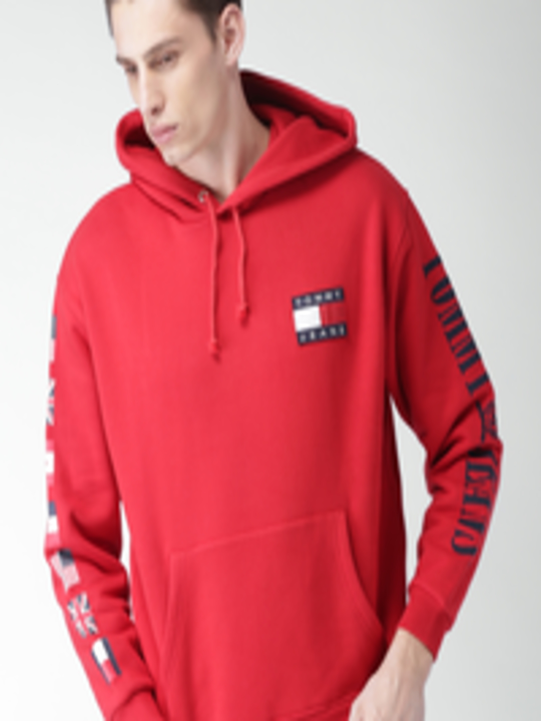 Buy Tommy Hilfiger Men Red Solid Hooded Sweatshirt - Sweatshirts for ...