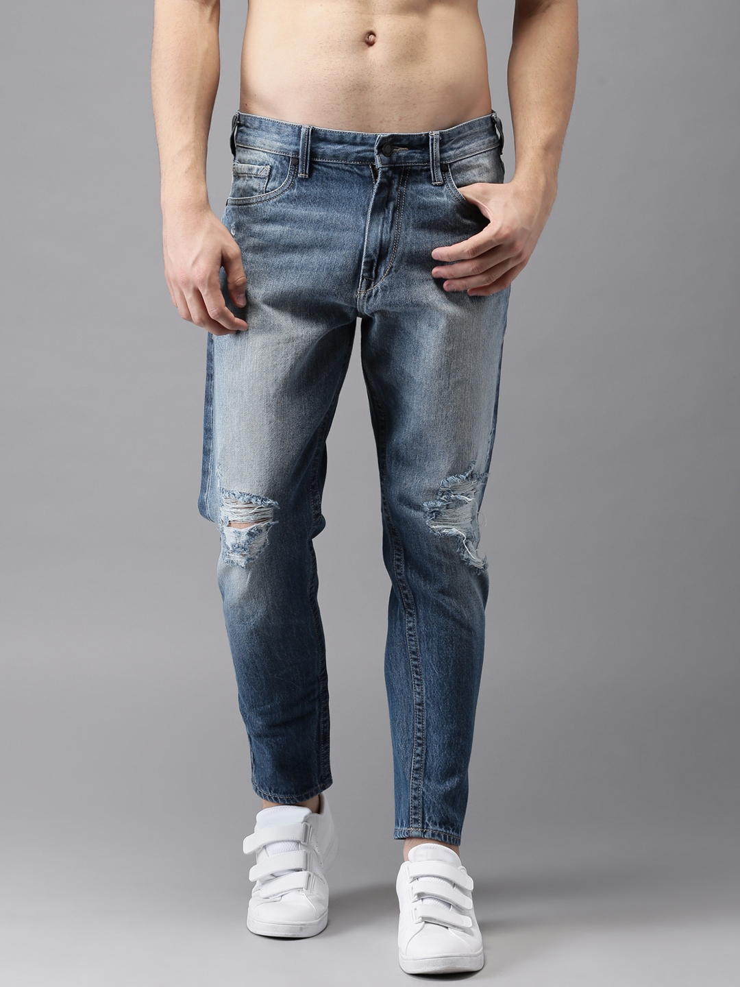 highly distressed jeans