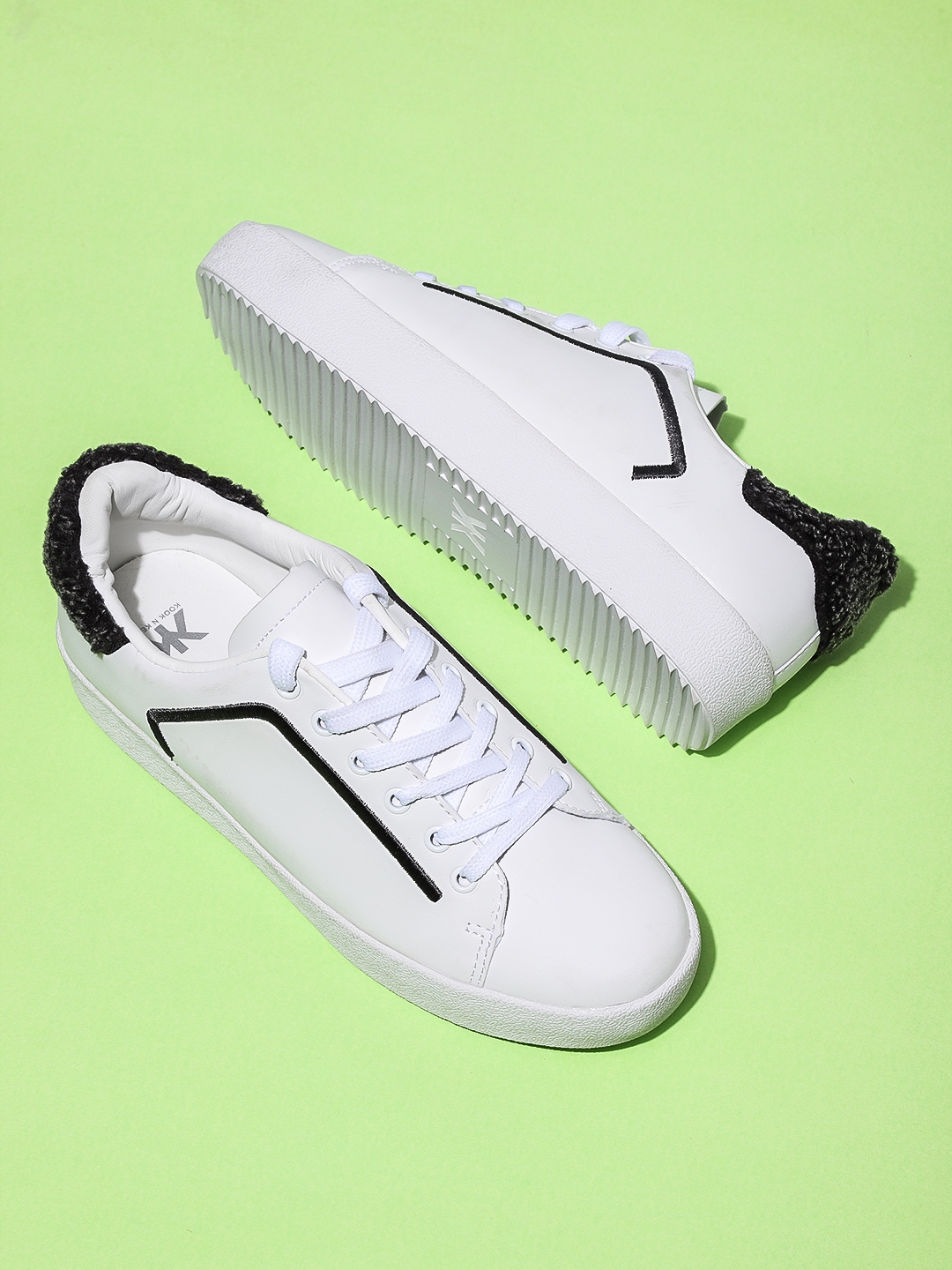 ucb white sneakers myntra