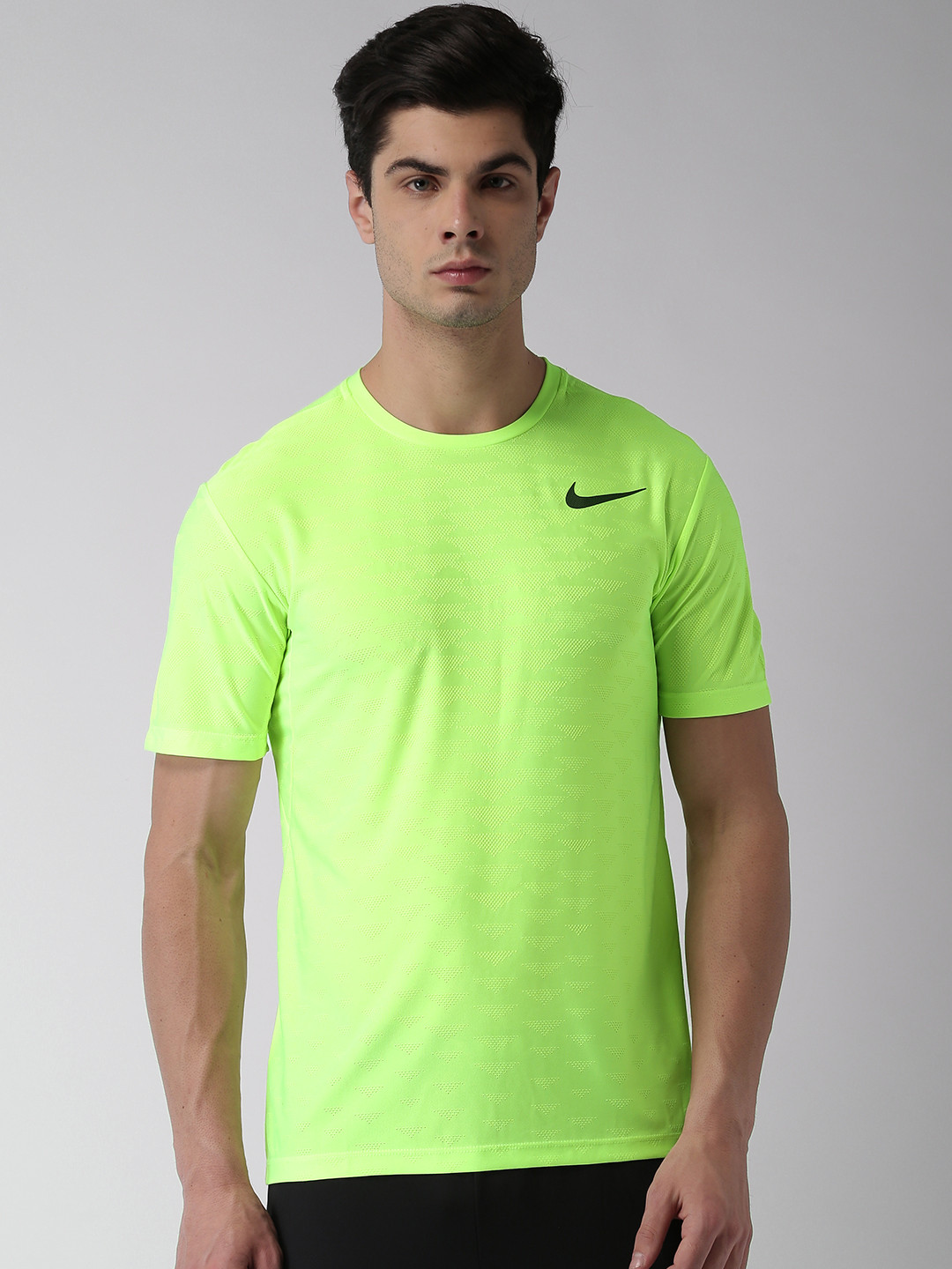 fluorescent green nike shirt