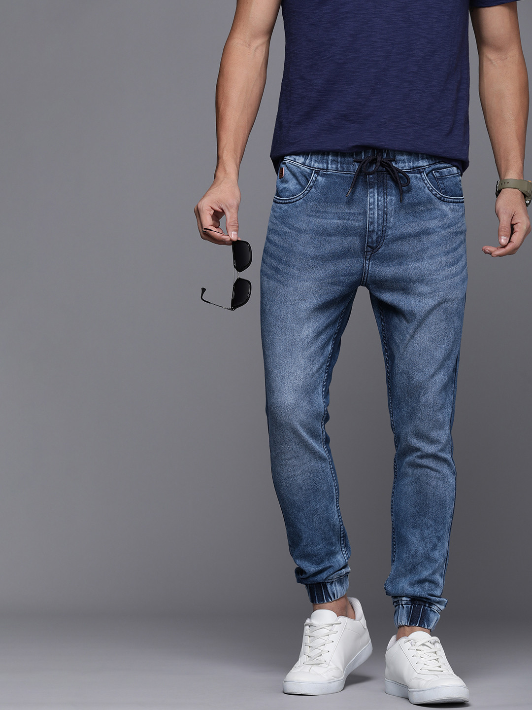 Buy WROGN Men Mid Rise Light Fade Stretchable Jogger Fit Jeans Jeans