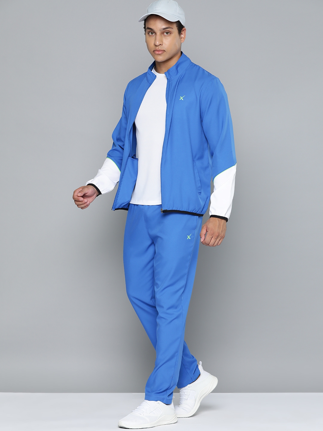 Buy HRX By Hrithik Roshan Men Solid Running Tracksuit - Tracksuits for ...