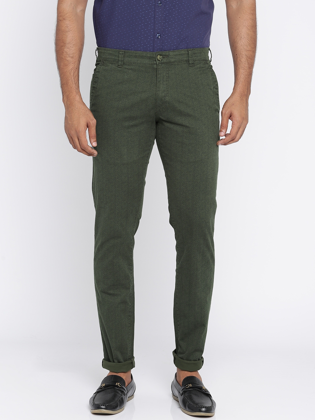 green tapered trousers