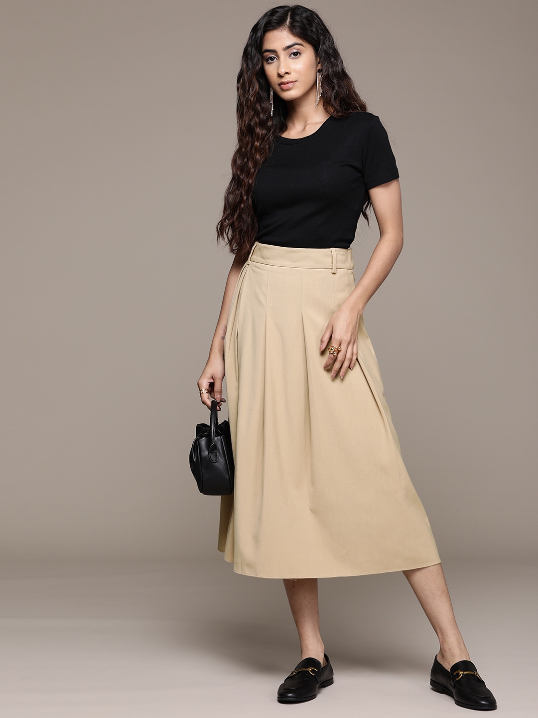 Buy MANGO Women Solid Pleated A Line Midi Skirt - Skirts for Women ...