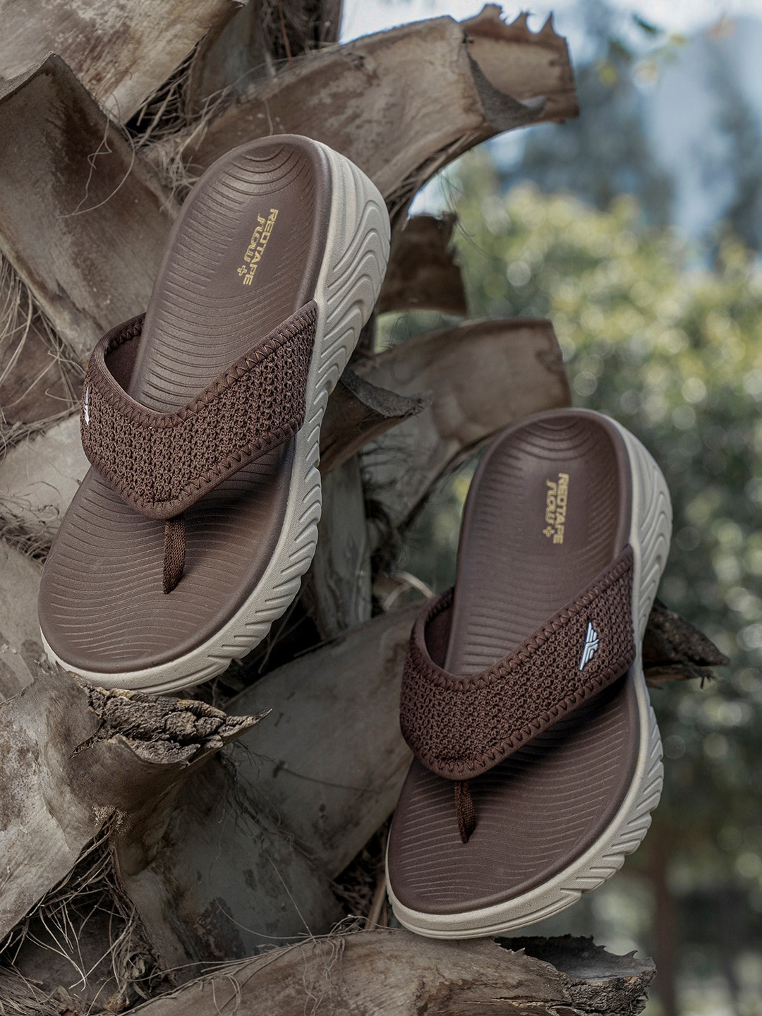 men red tape flip flops