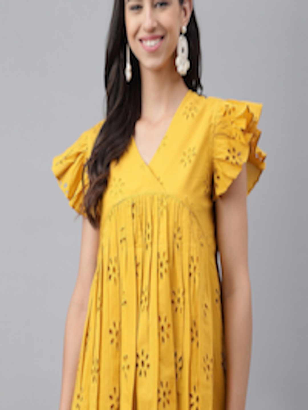 Buy Janasya Mustard Yellow Self Design Flutter Sleeve Cotton Empire Top ...