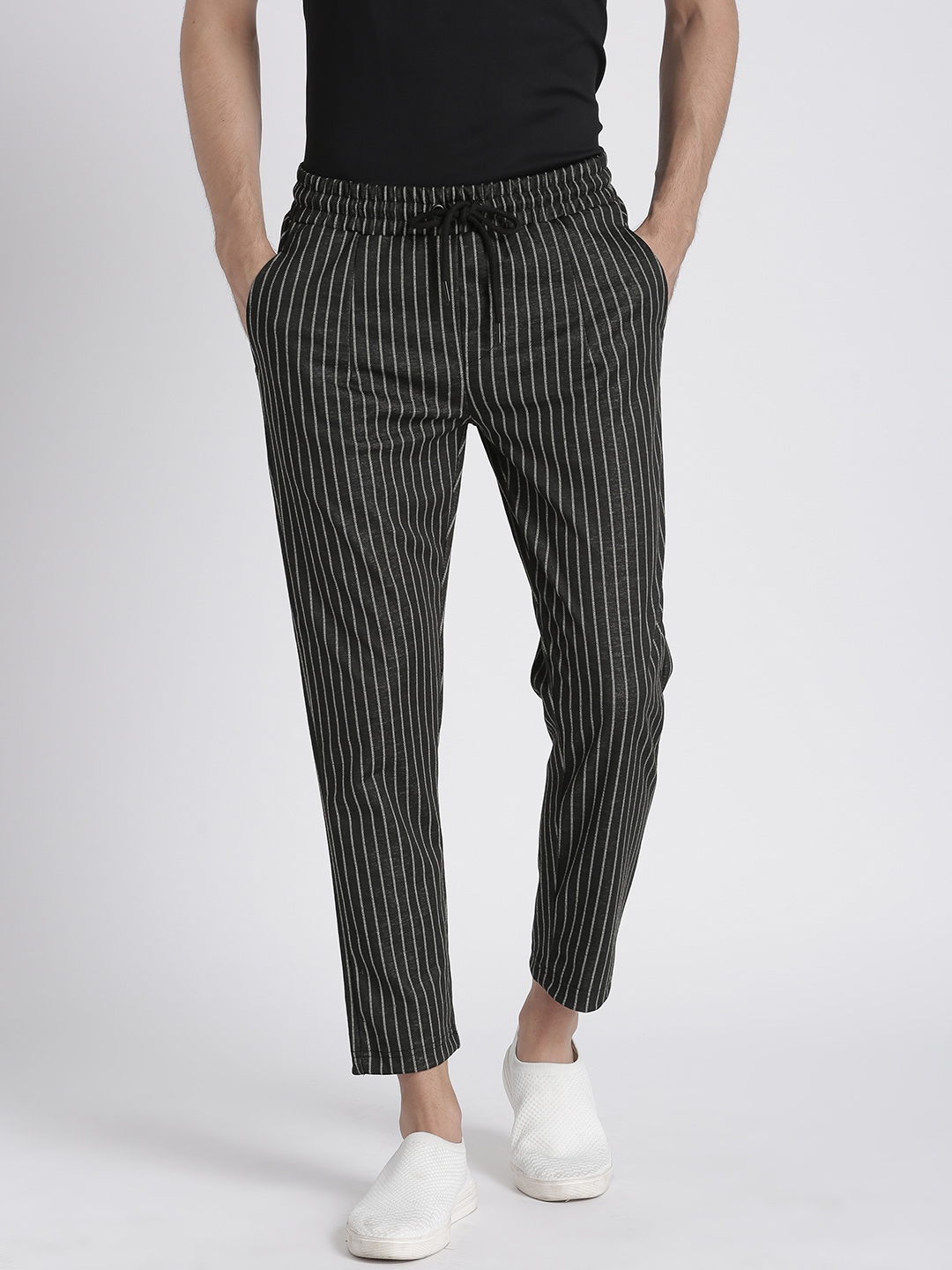 green and white striped trousers
