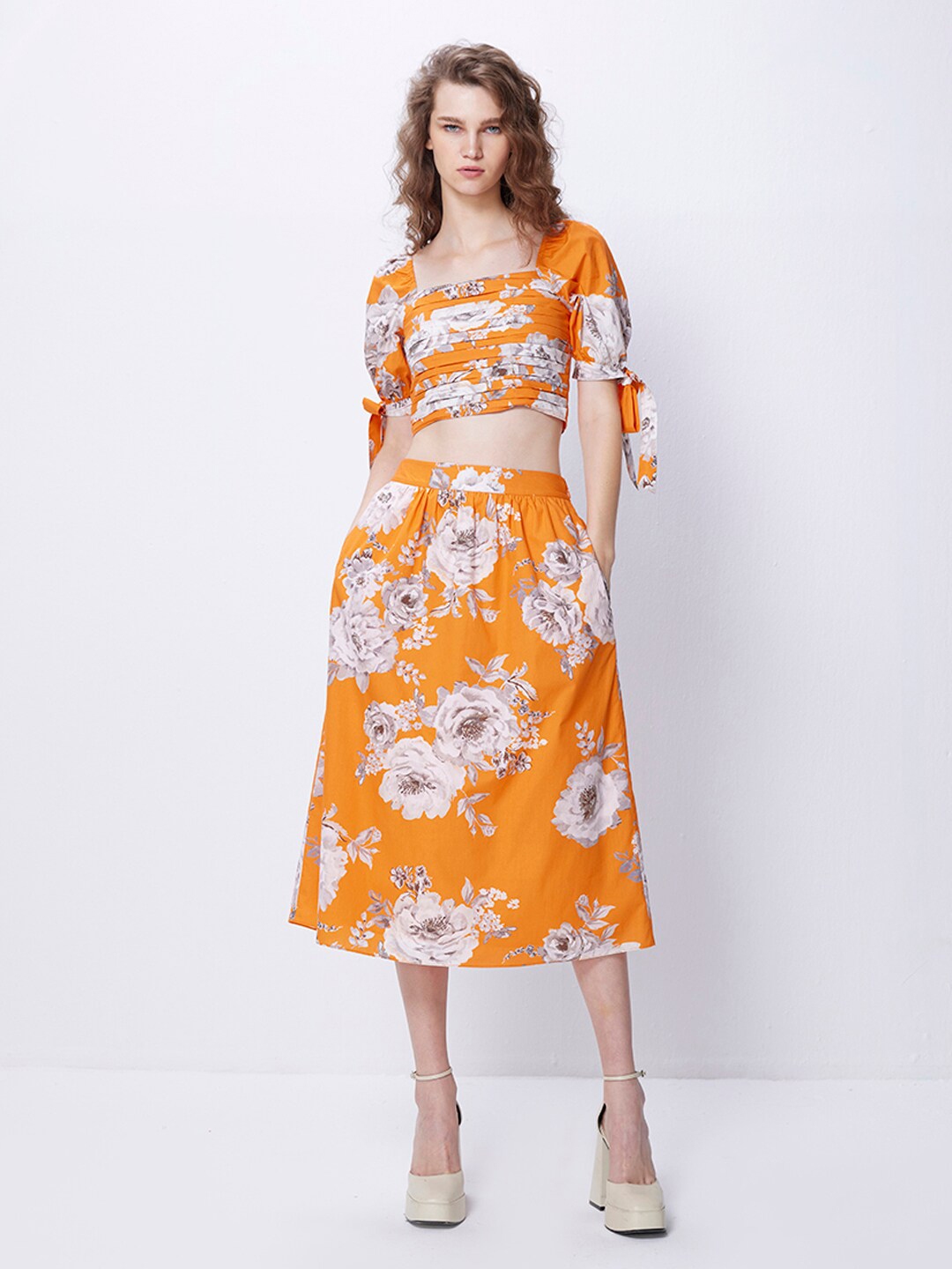Buy COVER STORY Orange Floral Printed Puff Sleeve Cotton Blouson Crop ...