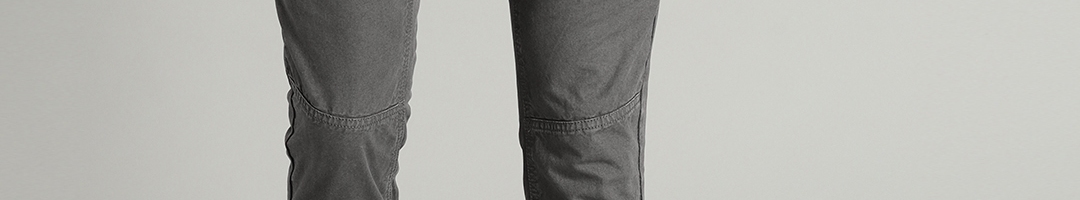 Buy Roadster Men Charcoal Grey Slim Fit Solid Chinos - Trousers for Men ...