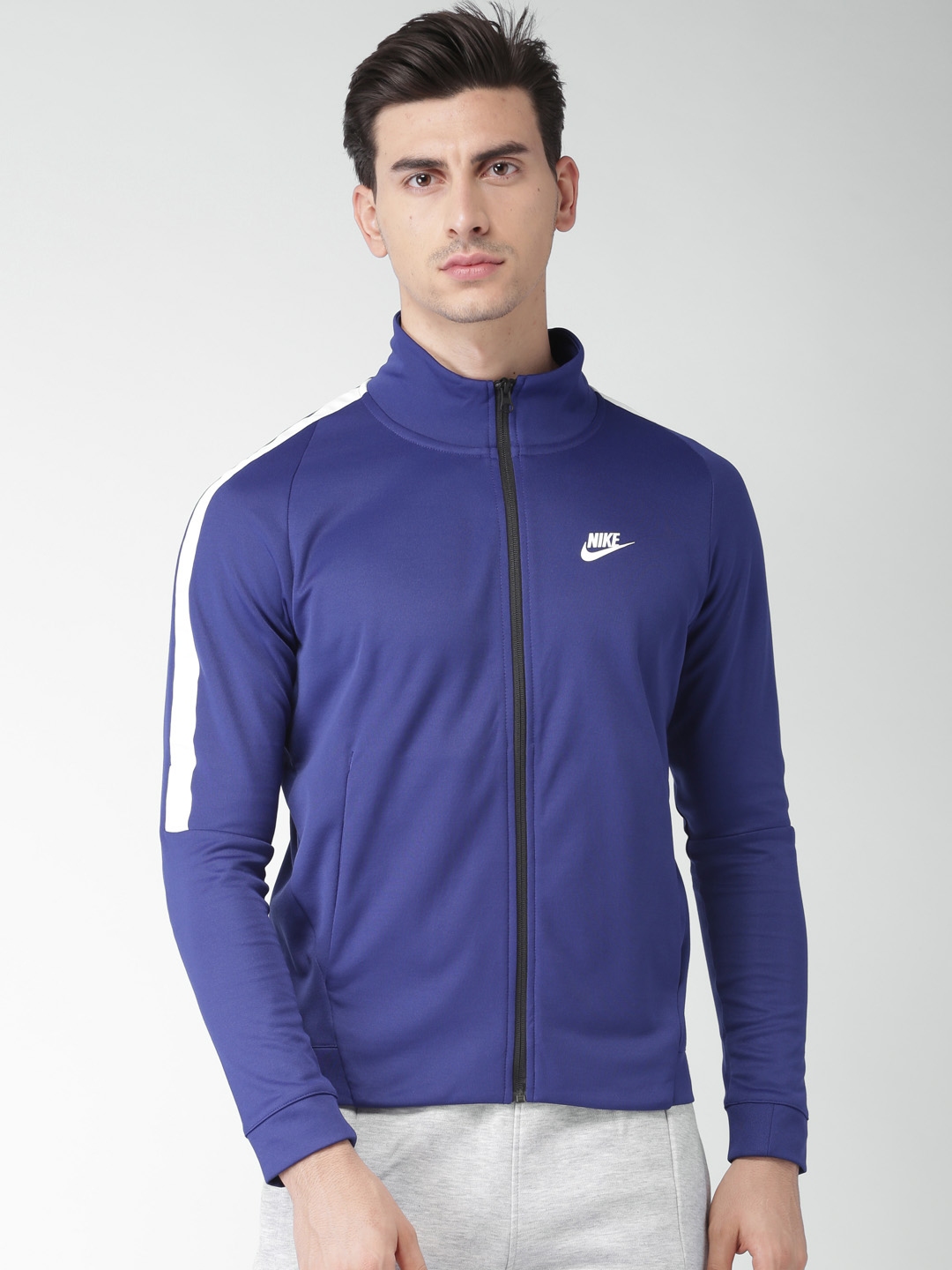 Buy Nike Men Blue Solid Sporty AS M NSW N98 JKT PK TRIBUTE Jacket ...