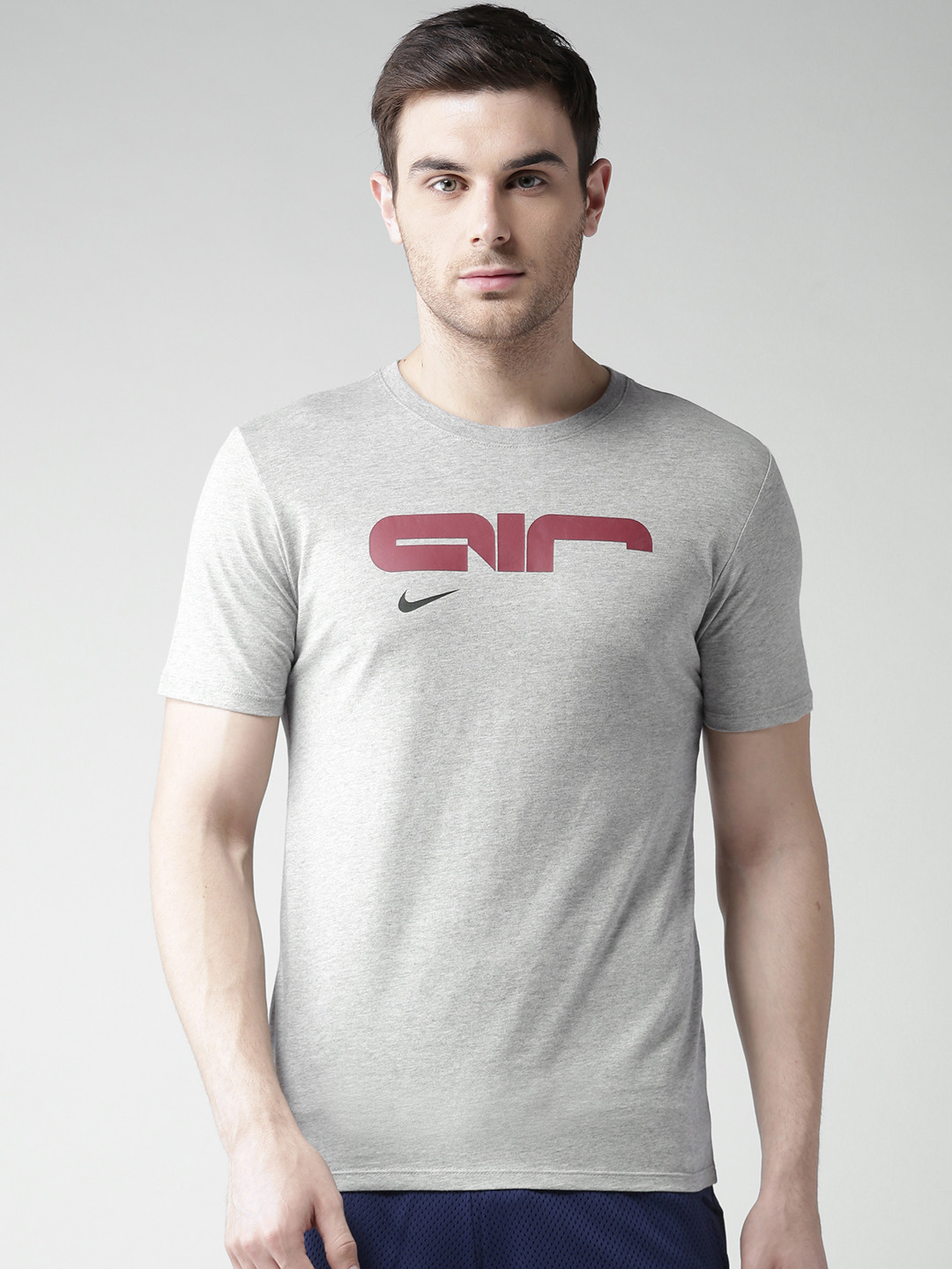 Buy Nike Men Grey Melange Solid Round Neck Pure Cotton T Shirt