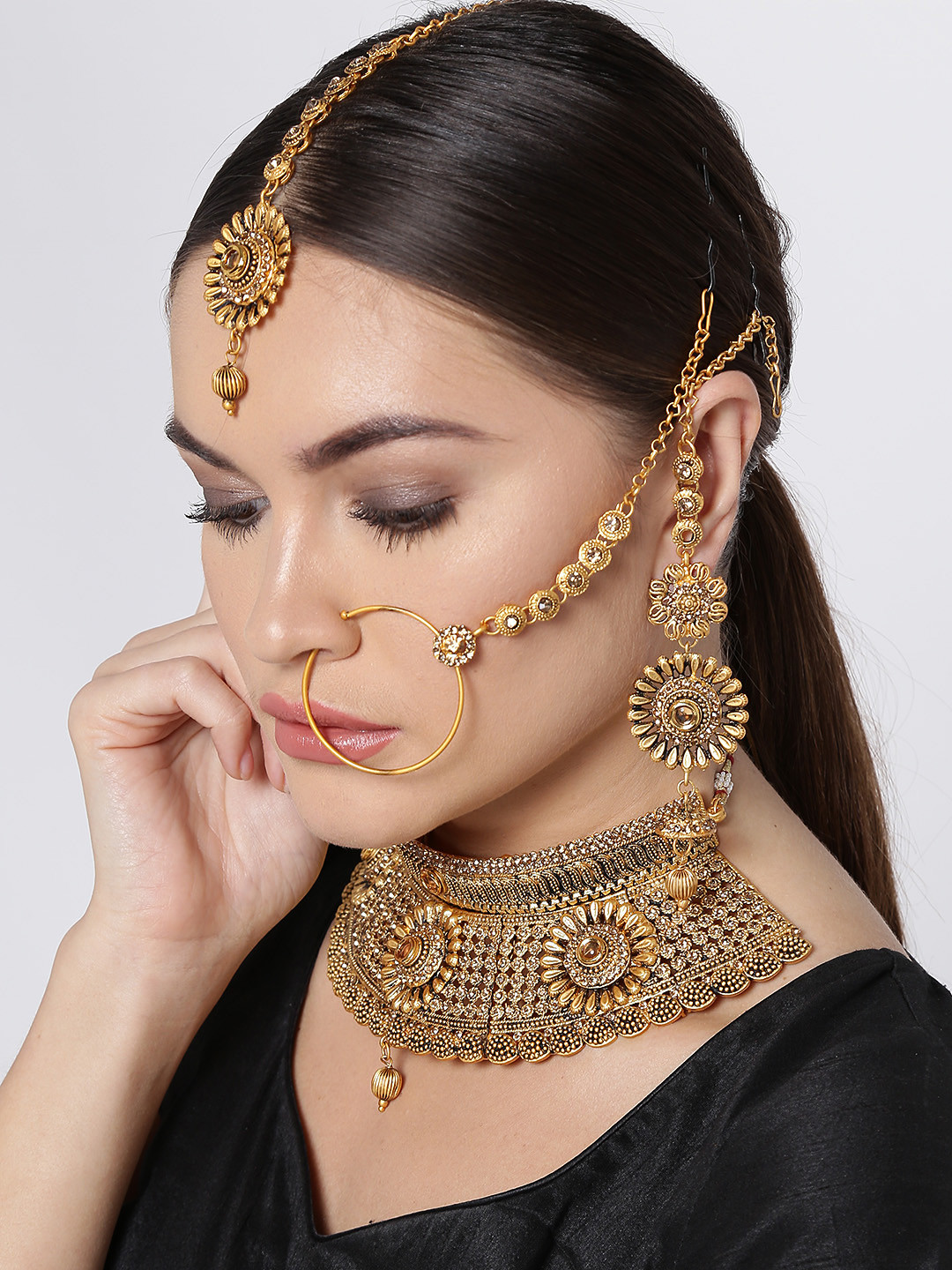 Buy Zaveri Pearls Gold Toned Stone Studded Textured Jewellery Set