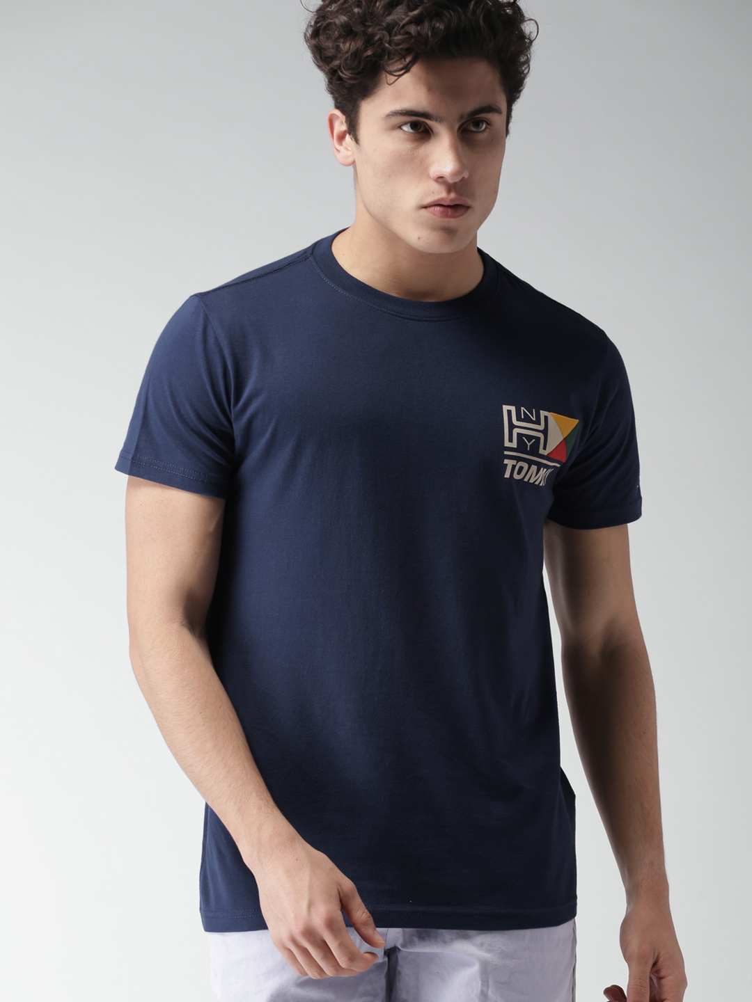 Buy Tommy Hilfiger Men Navy Blue Solid Round Neck T Shirt - Tshirts for ...