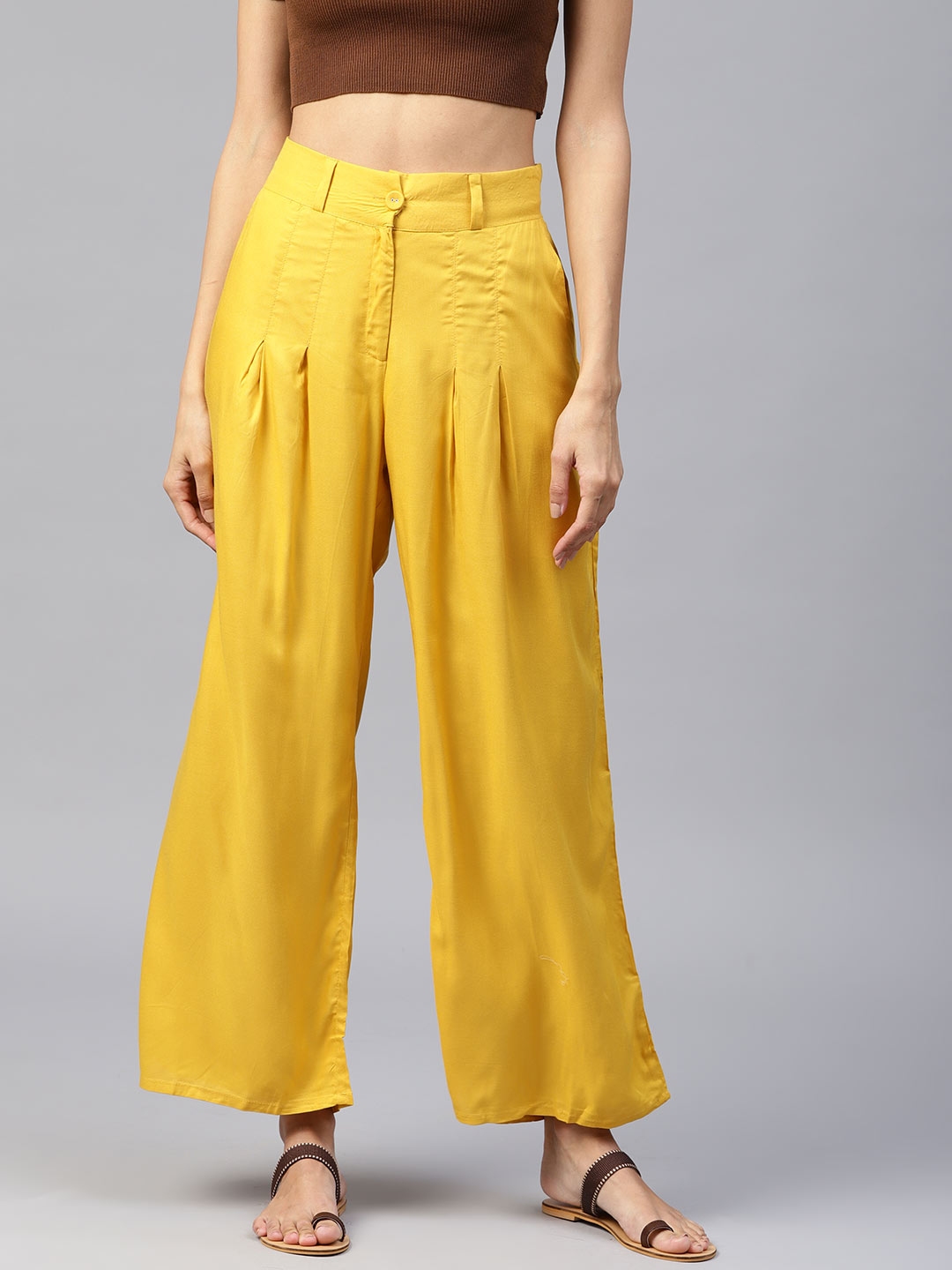 yellow leather trousers