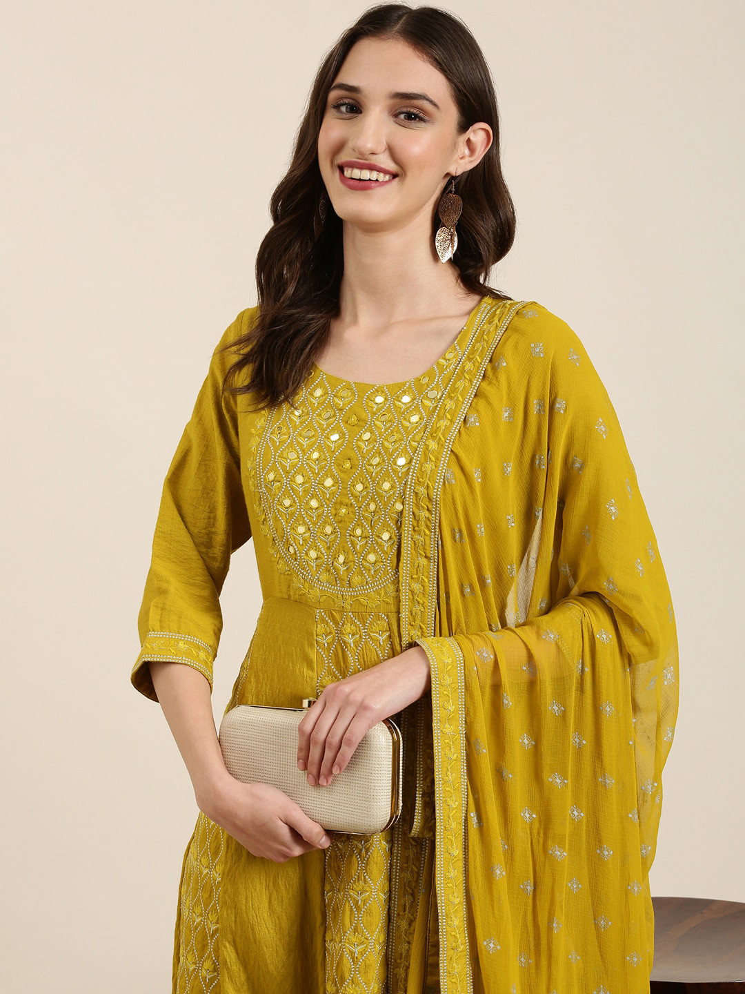Women Ethnic Motifs Embroidered Mirror Work Kurta with Trousers