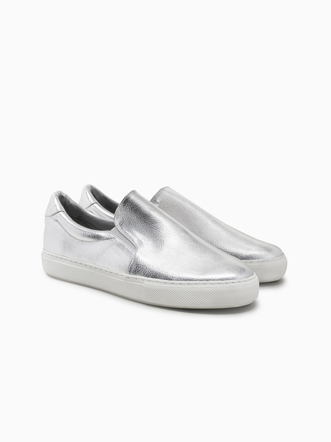 sperry silver slip on sneakers