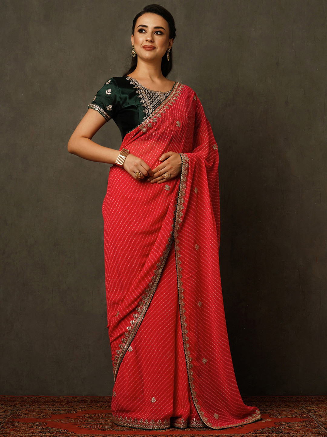 Women Pink Embellished Bandhani Laheriya Georgette Saree