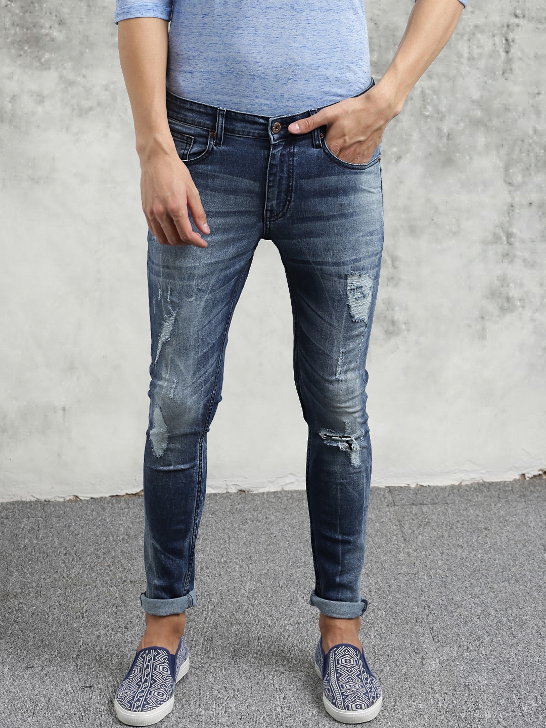 highly distressed jeans