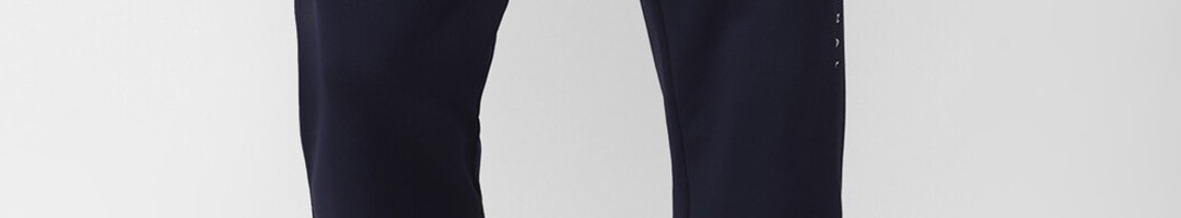 Buy Reebok Men Adv Speedwick Mid Rise Track Pants - Track Pants for Men ...
