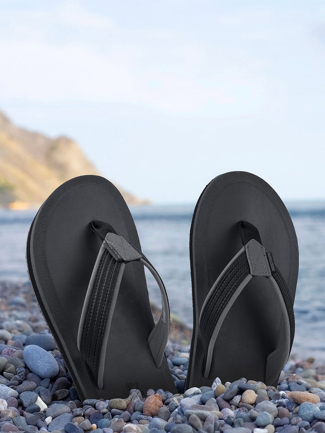 men red tape flip flops