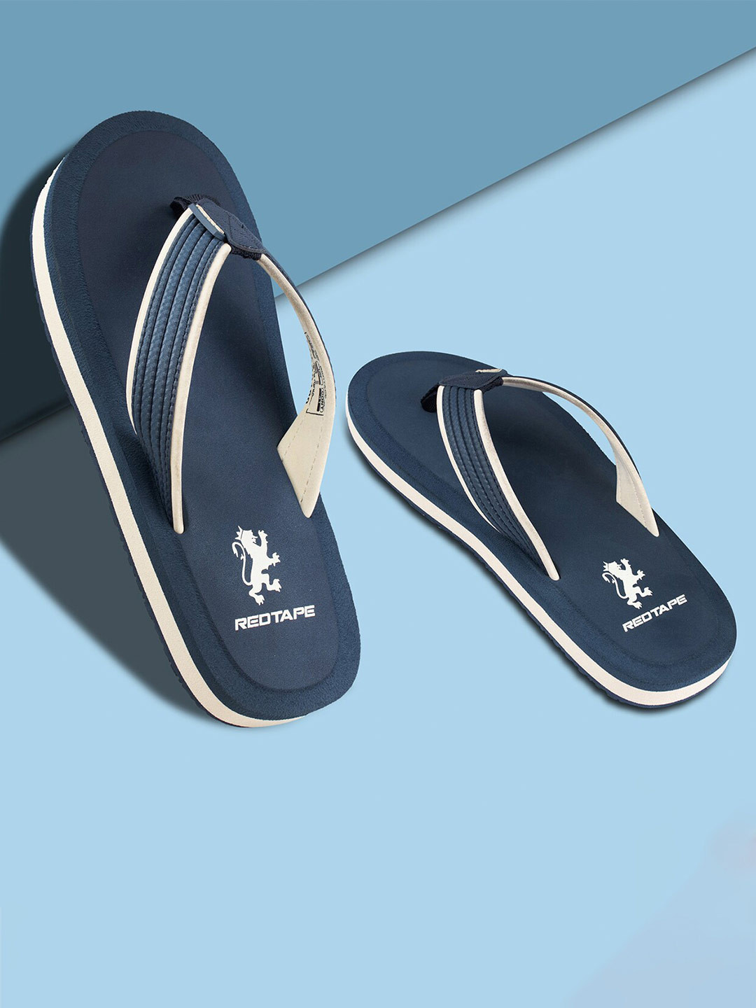 men red tape flip flops