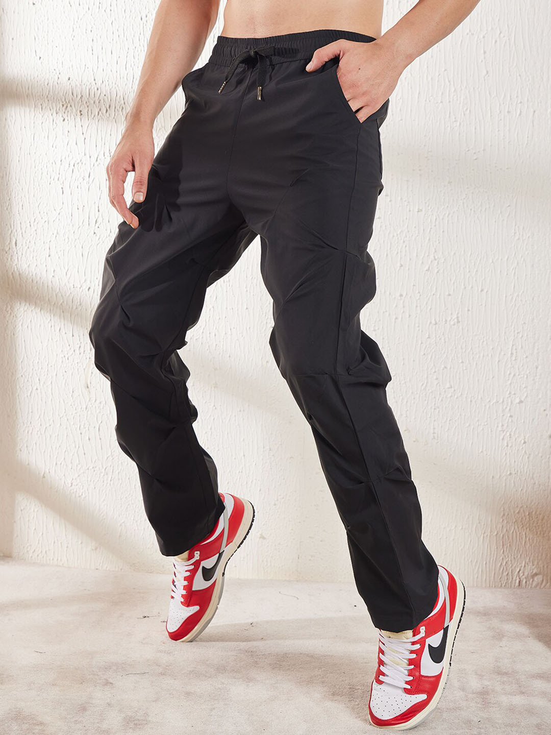 Buy FUGAZEE Men Black Parachute Pleated Relaxed Fit Track Pants Track