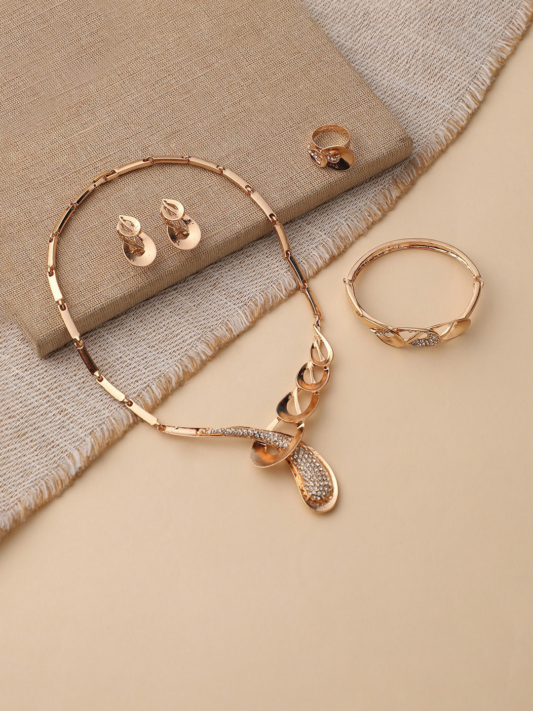 Buy DressBerry Gold Plated Stones Studded Jewellery Set Jewellery Set