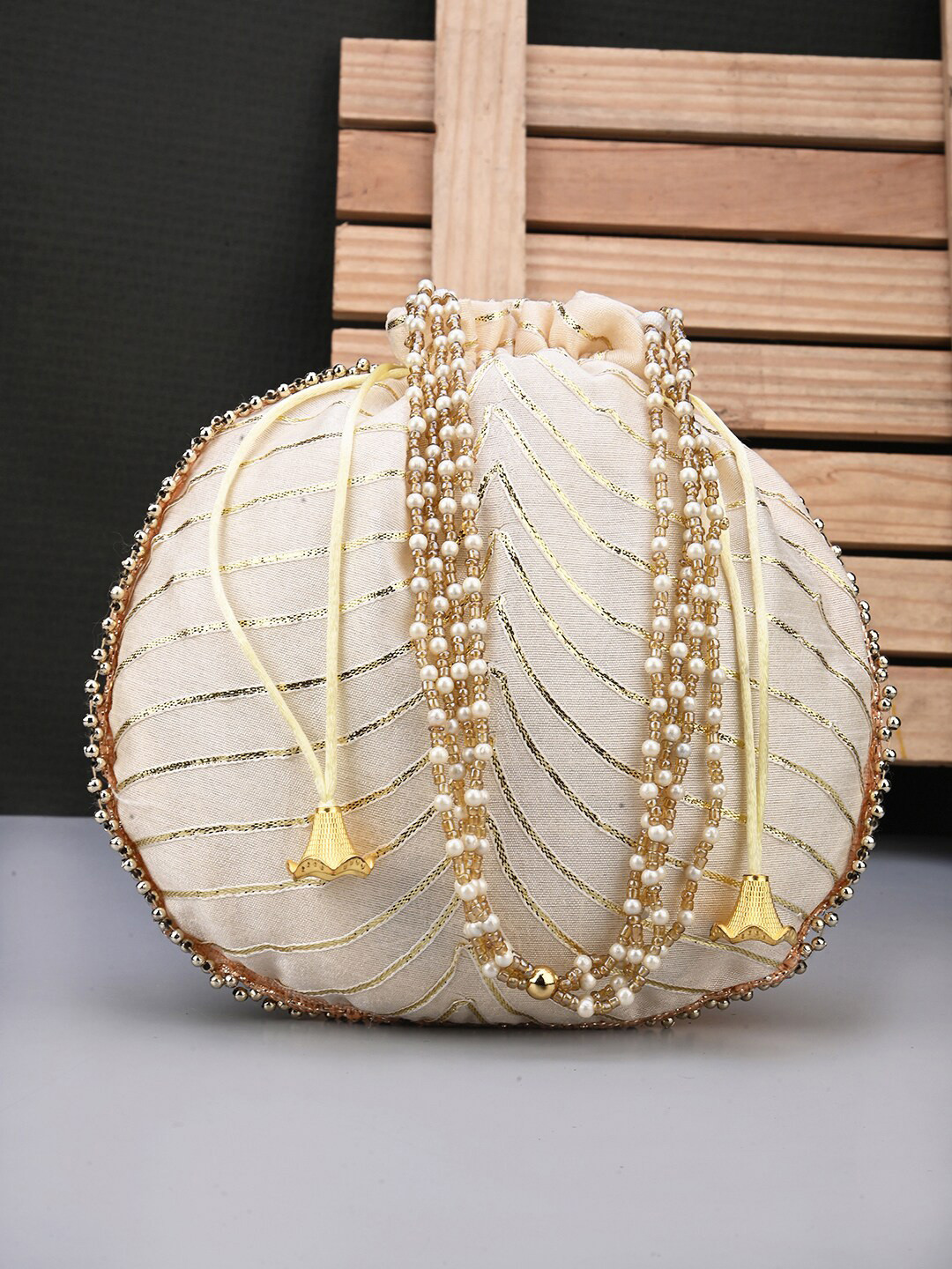 Beige & White Embellished Tasselled Potli Clutch – Faux Silk Ethnic Bag with Wrist Loop