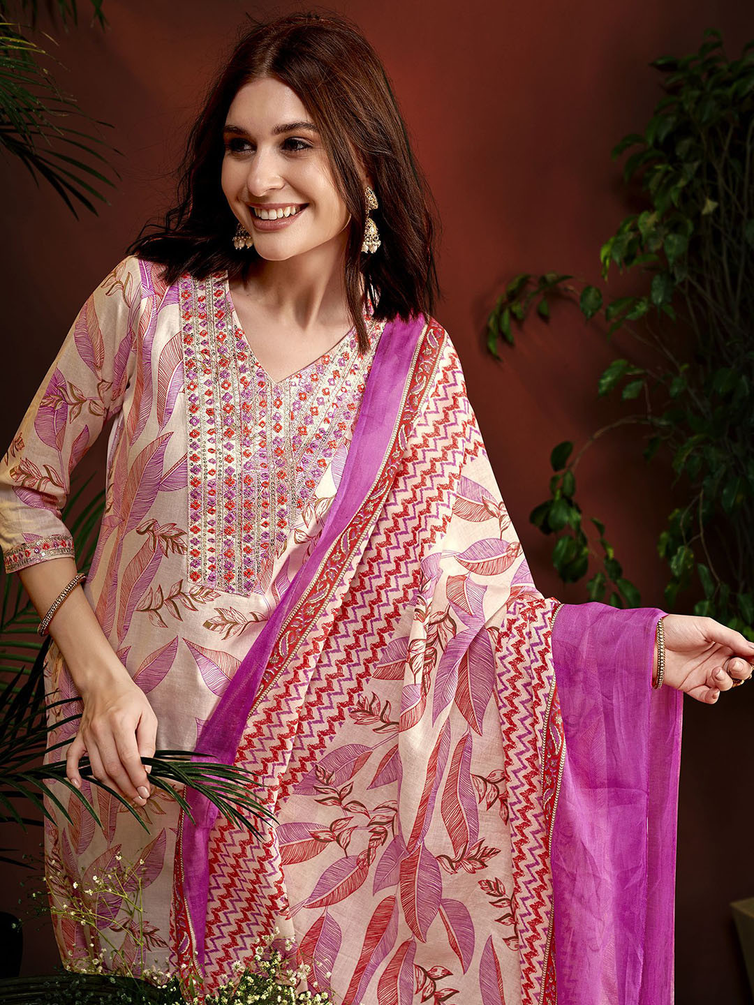 Women Magenta Pink Floral Embroidered Pleated Sequinned Net Kurta with Trousers main image 0