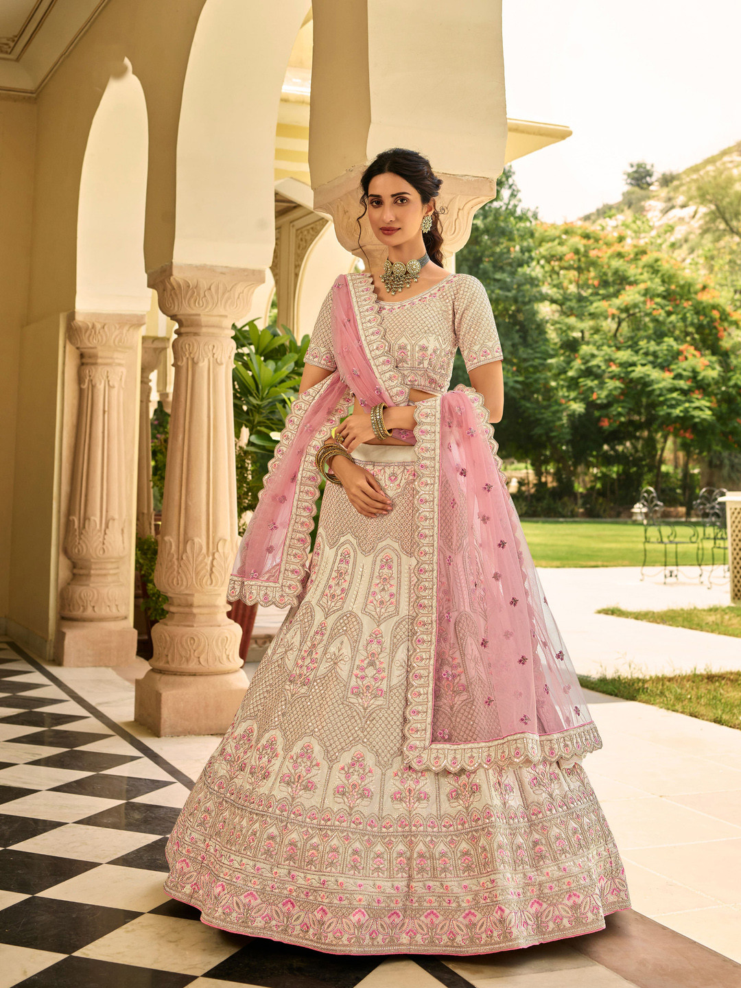 Circular tiered  lehenga with embroidered blouse and foil dupatta