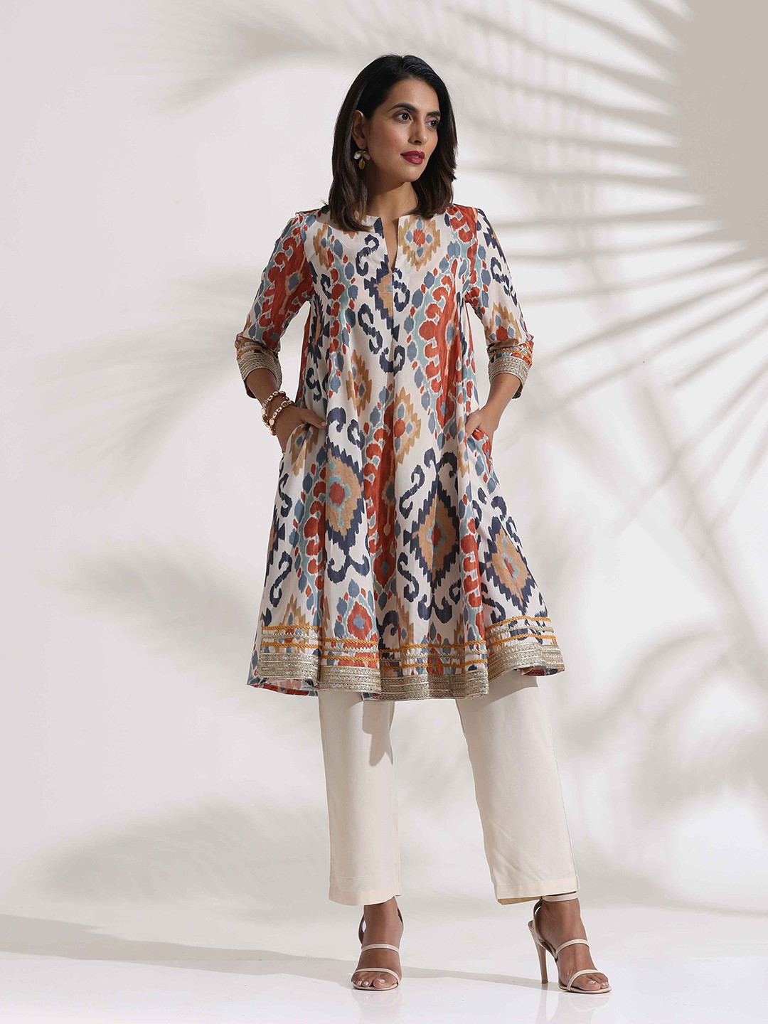 Vivo Taji Long Sleeve V-Neck Tunic Top - Brown / Mustard Ikat Abstract Print main image 0