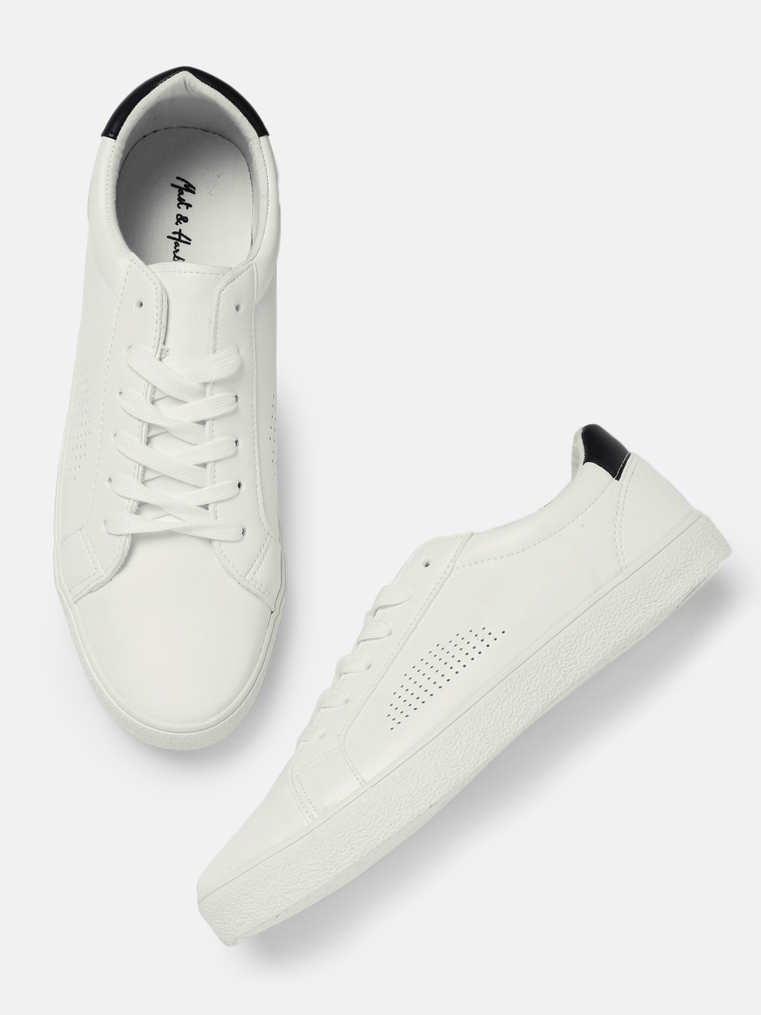 ucb white sneakers myntra