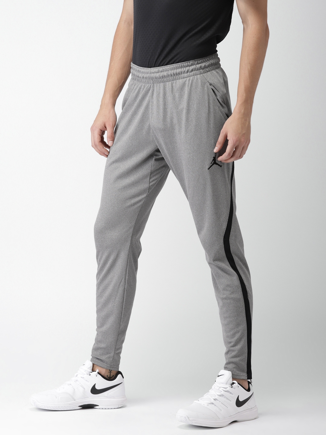 Buy Nike Men Grey ALPHA DRY Solid Track Pants - Track Pants for Men ...