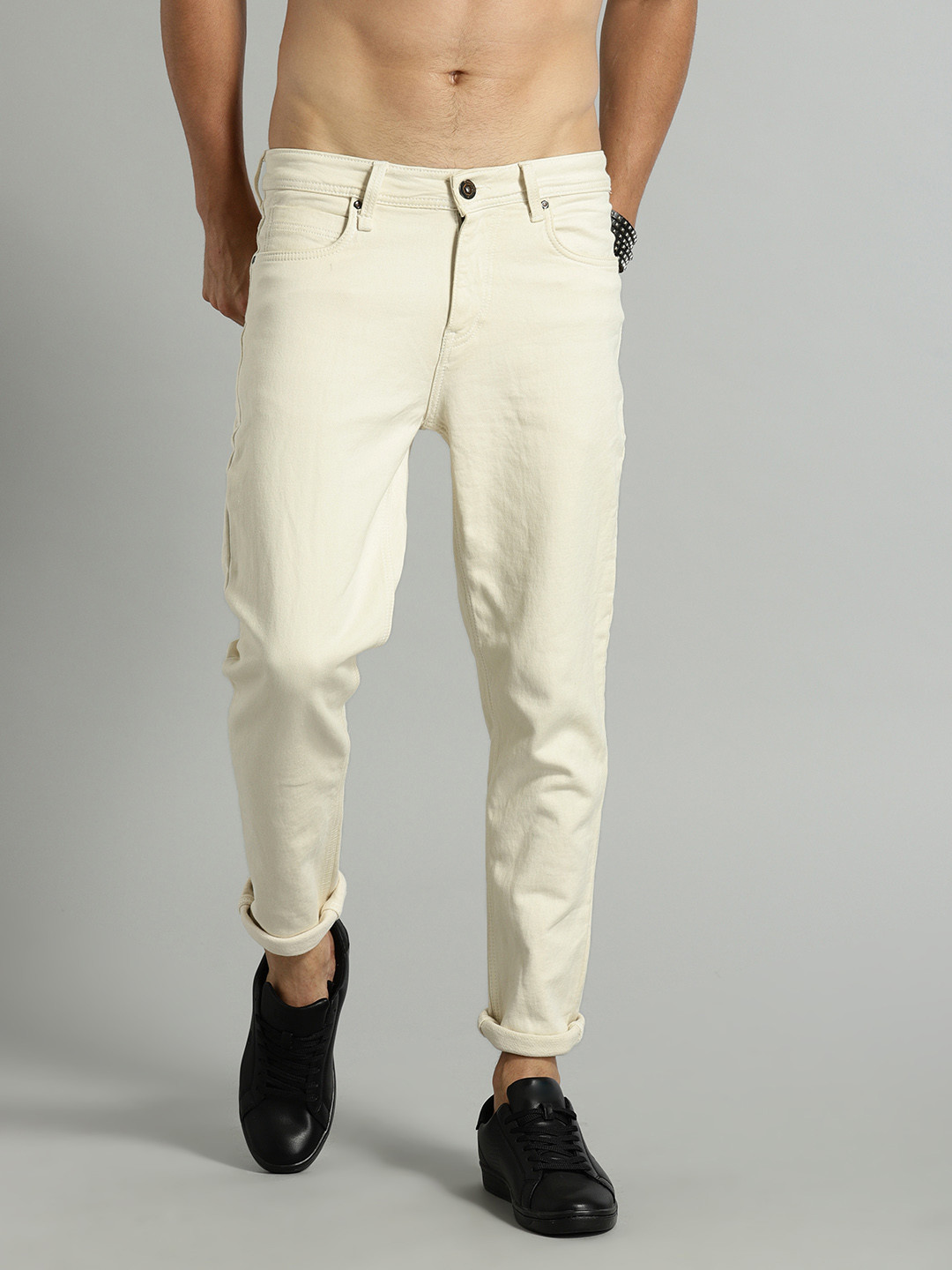 Buy Roadster Men Cream Coloured Carrot Fit Mid Rise Clean Look