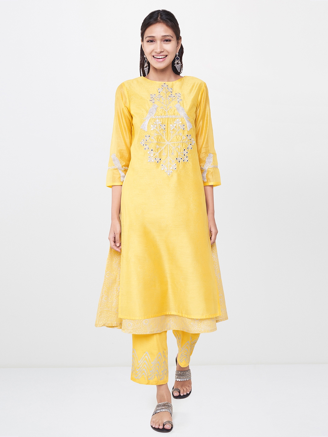 Buy Global Desi Women Yellow Self Design Layered Kurta With Trousers ...