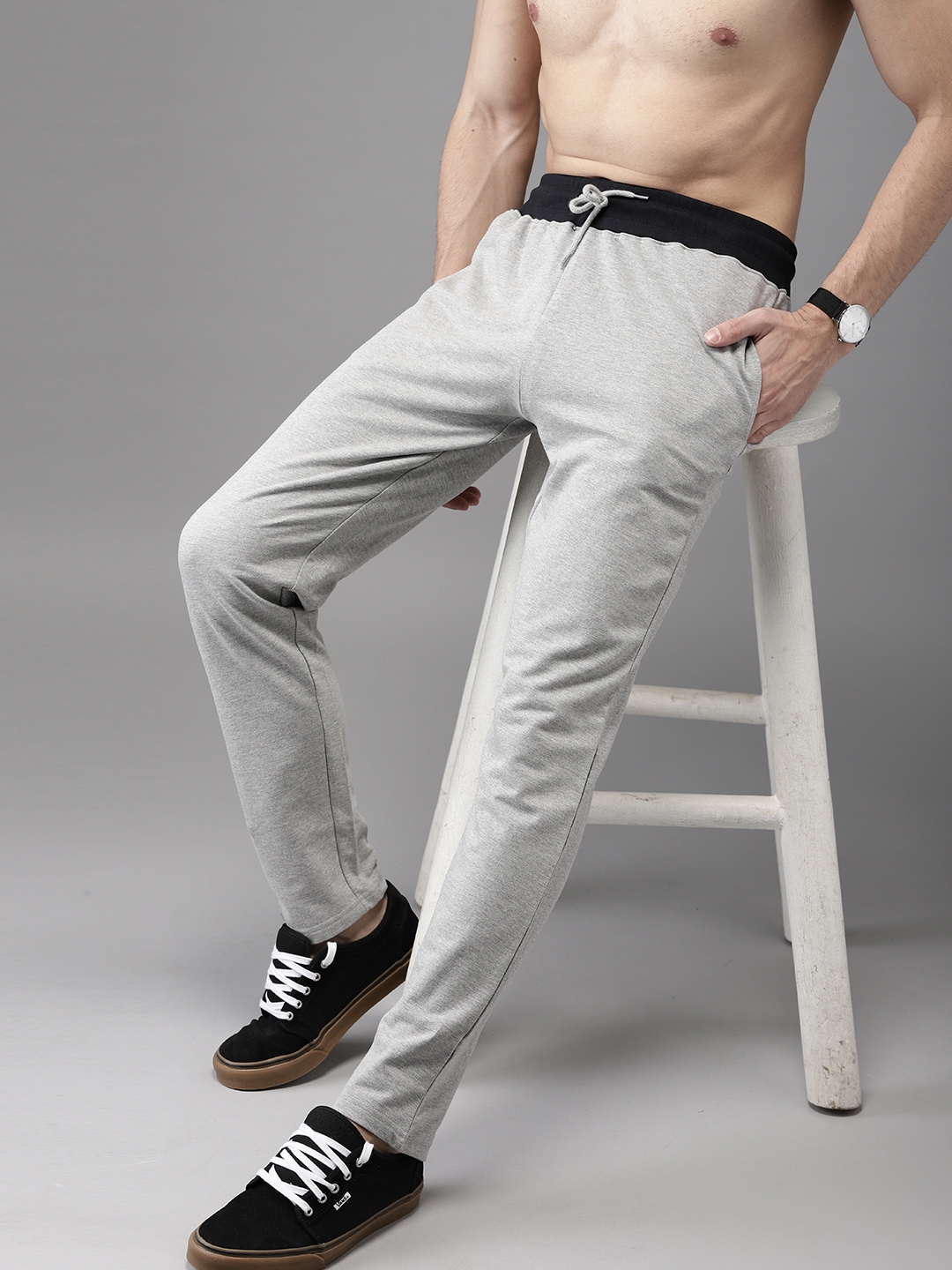 guys in grey track pants