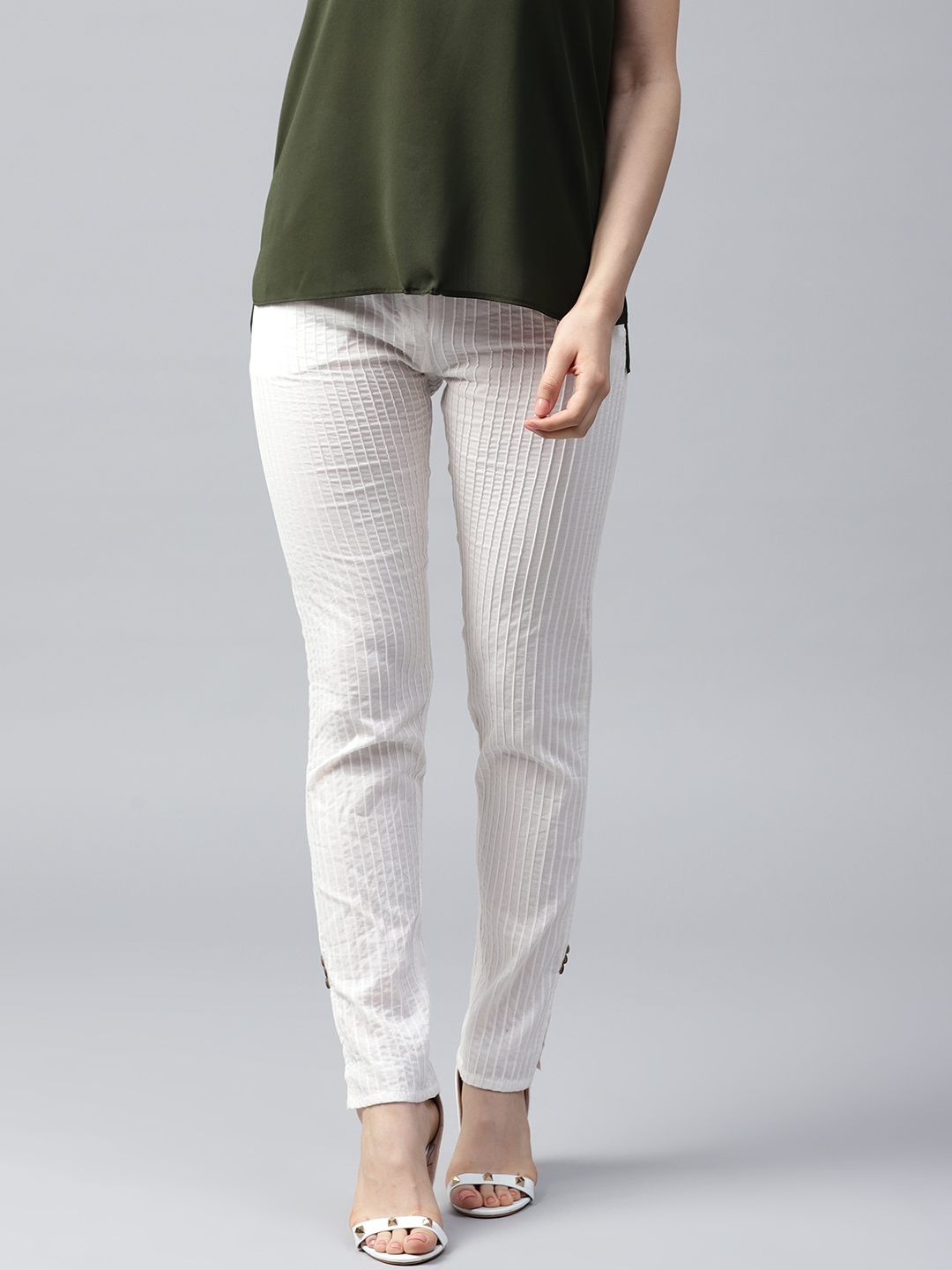 green and white striped trousers