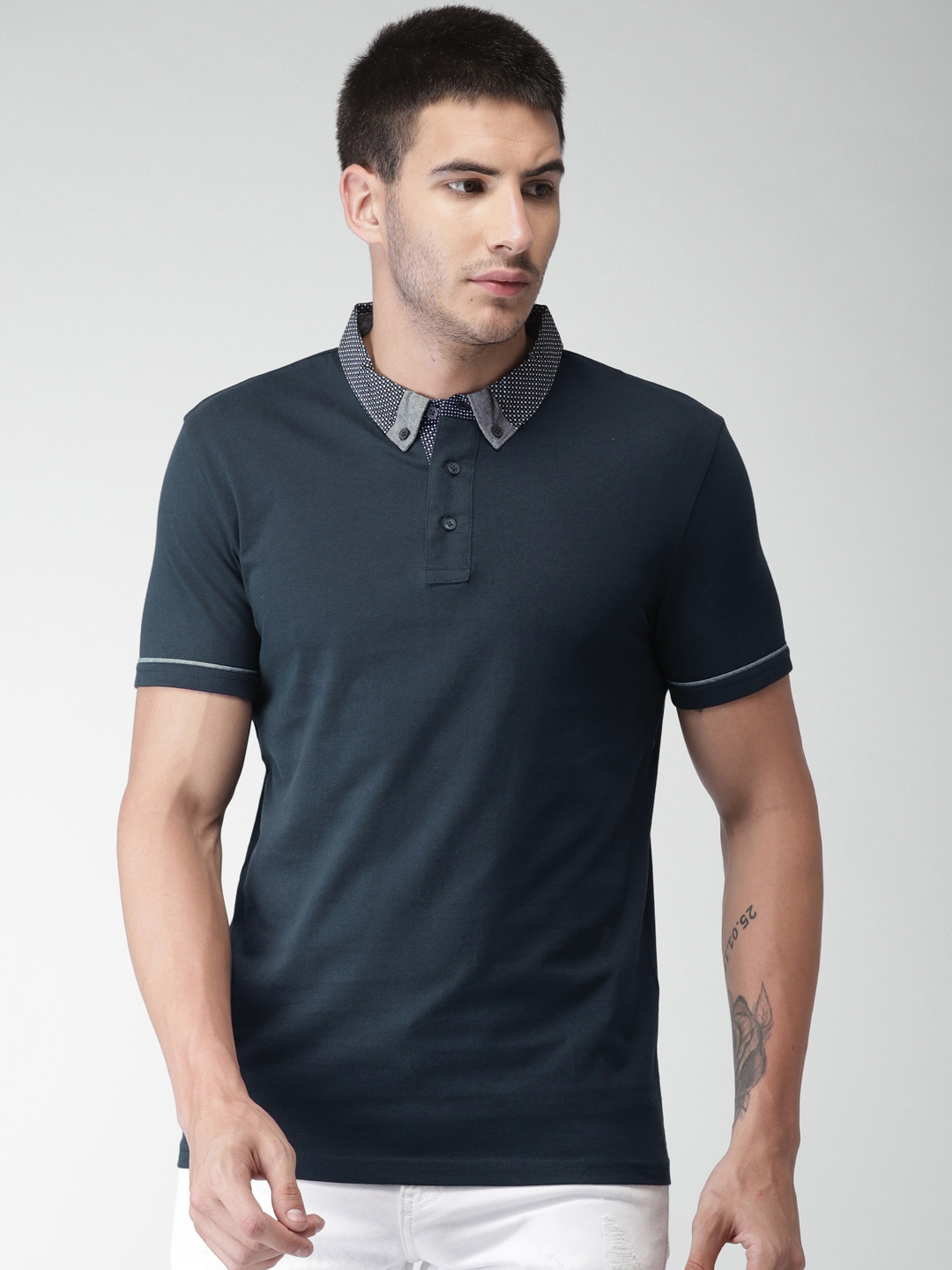 Buy Celio Men Navy Blue Solid Polo Collar T Shirt - Tshirts for Men ...