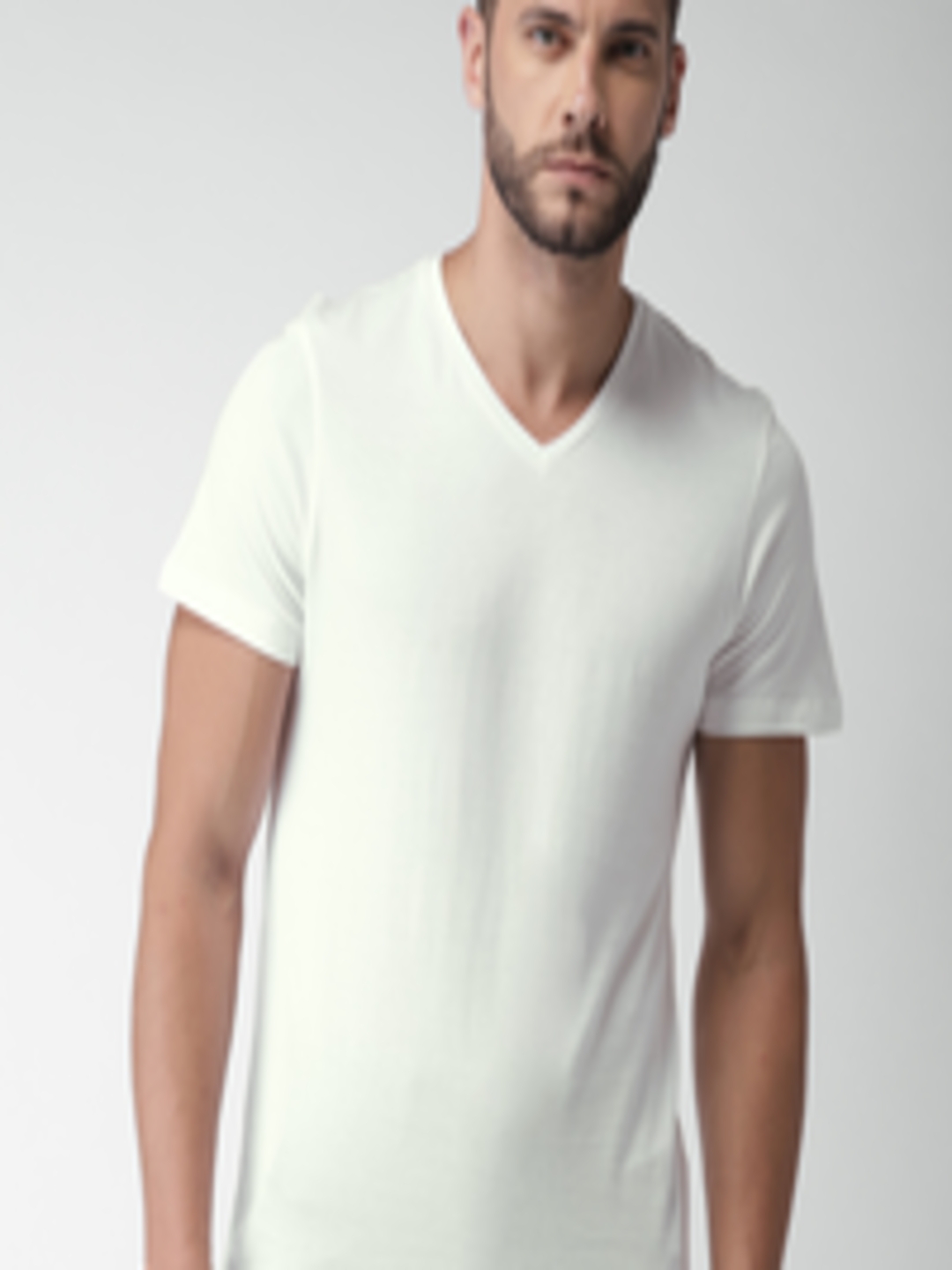 Buy Celio Men White Solid V Neck T Shirt - Tshirts for Men 5561682 | Myntra