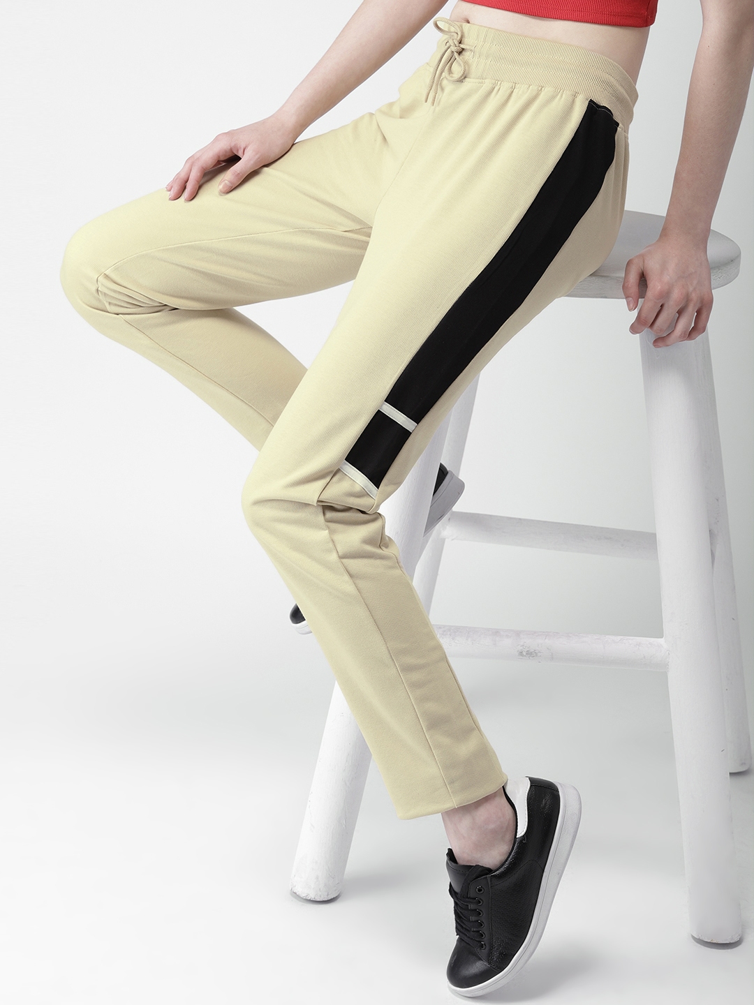 beige track pants