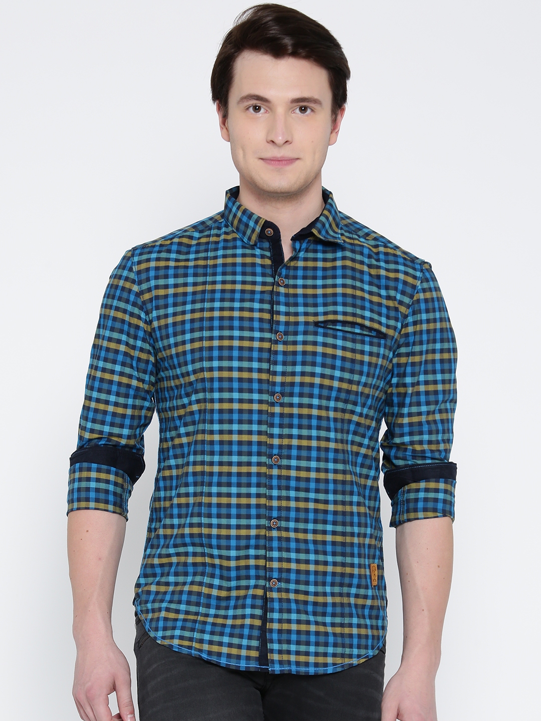 olive green shirt with blue jeans