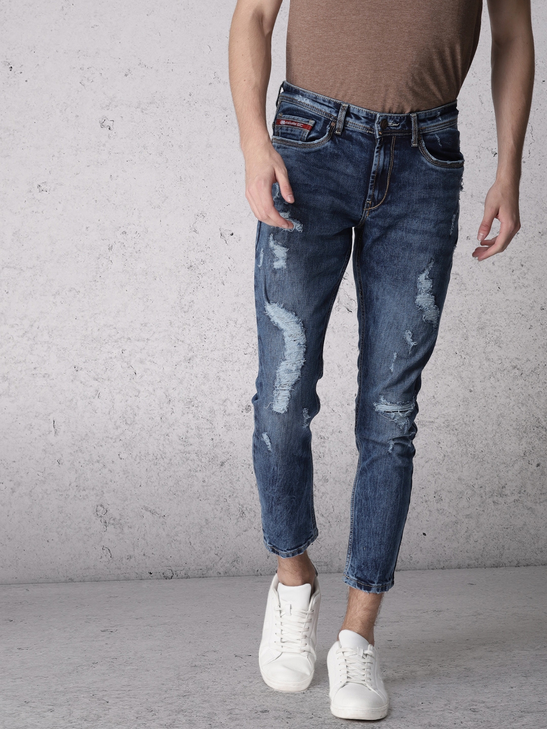 highly distressed jeans