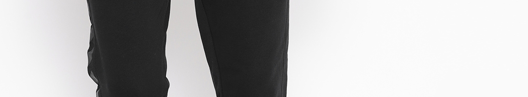 Buy Hummel Men Black Solid Joggers - Track Pants for Men 6928591 | Myntra