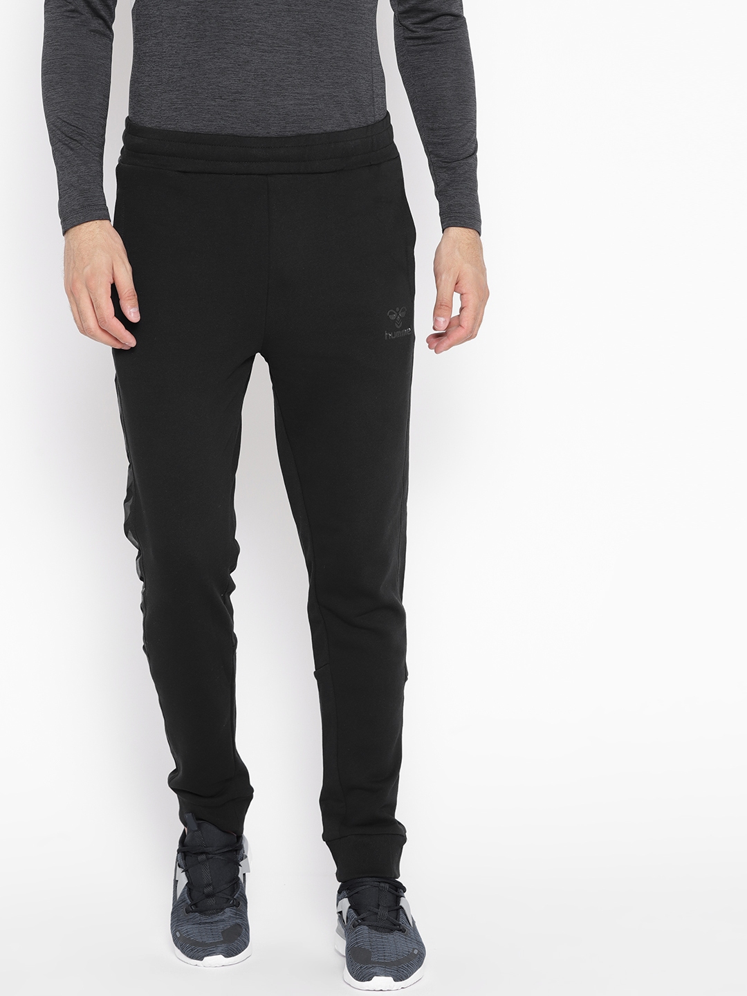 Buy Hummel Men Black Solid Joggers - Track Pants for Men 6928591 | Myntra