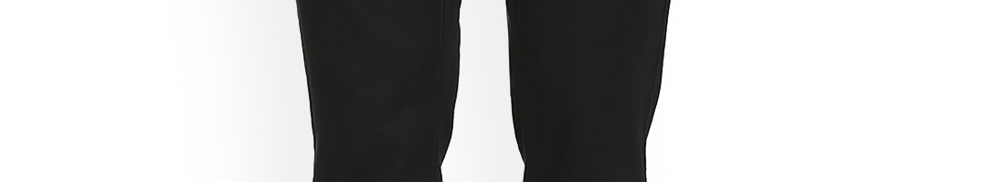 Buy Van Heusen Sport Men Black Slim Fit Solid Regular Trousers ...