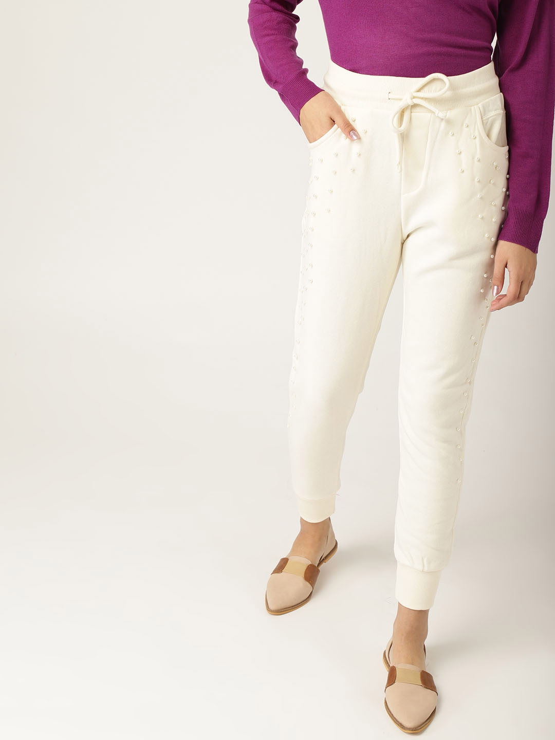 cream track pants