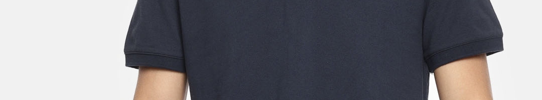 Buy Tommy Hilfiger Men Navy Blue Solid Polo Collar T Shirt - Tshirts ...