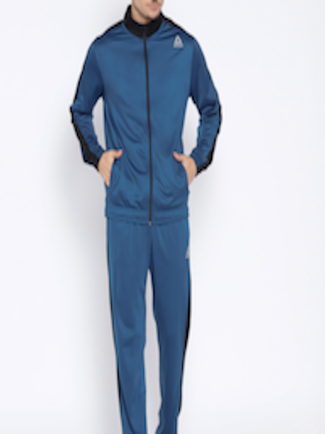 Buy Reebok Men Blue Solid TRICOT Training Tracksuit - Tracksuits for ...