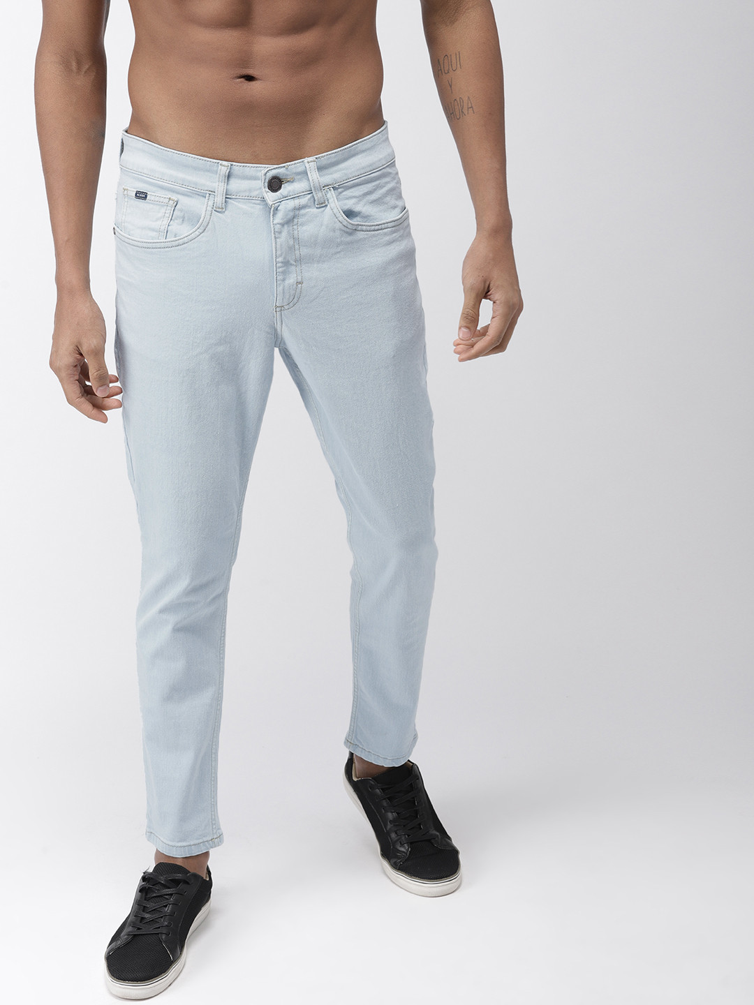 Buy HIGHLANDER Men Blue Tapered Fit Mid Rise Clean Look Stretchable ...