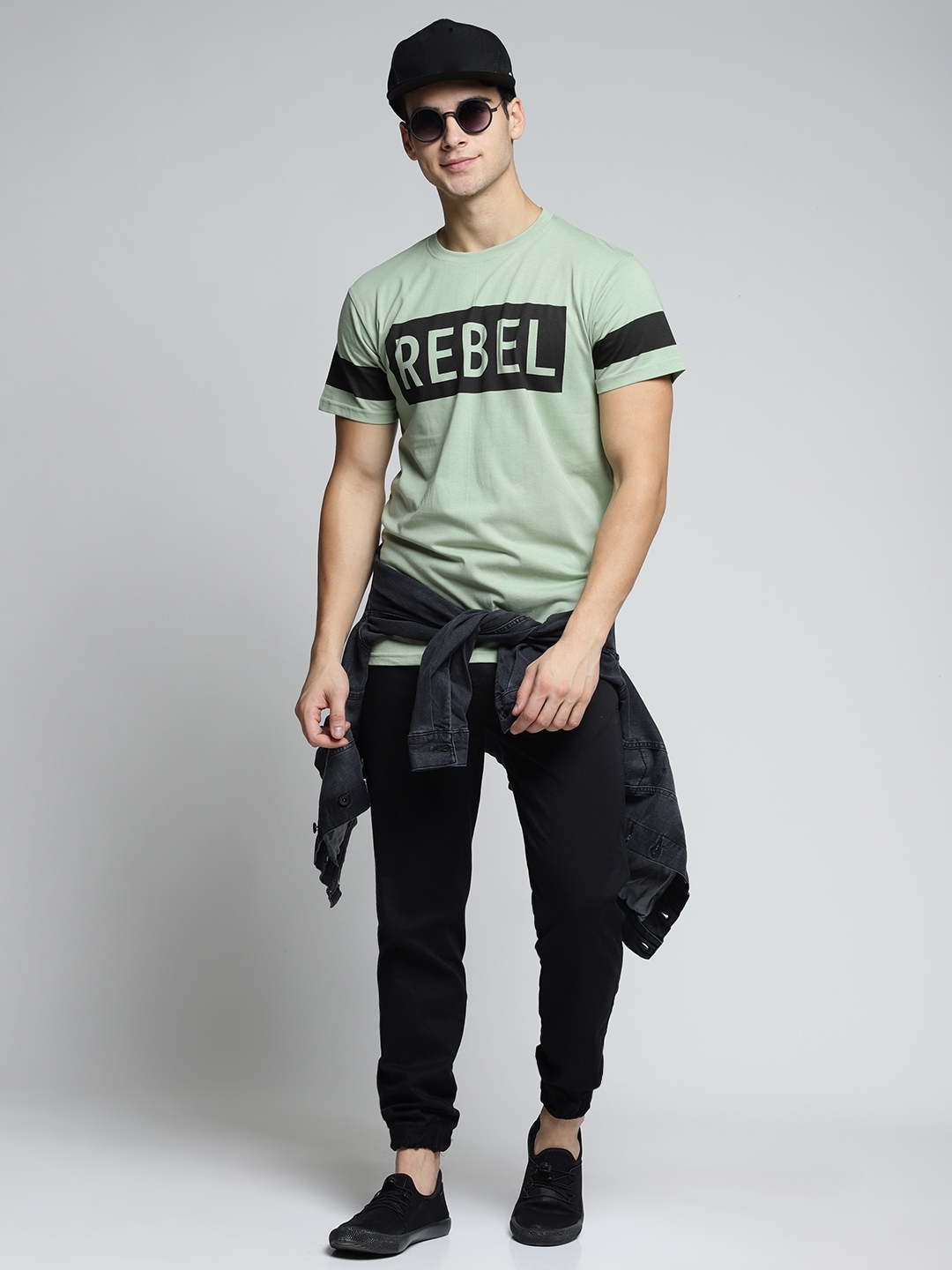 black t shirt green pants